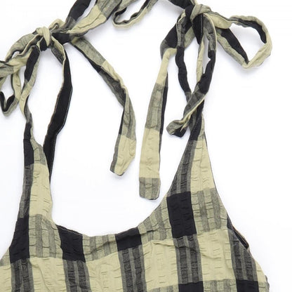 Close-up detail of ASOS women’s green check cotton a-line, size UK 6, scoop neck pullover