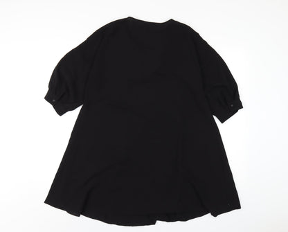 Back view of ASOS women’s black polyester a-line, size UK 6, v-neck pullover