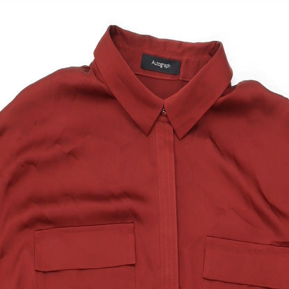 Close-up detail of Autograph women’s red polyester basic blouse, size UK 14, collared