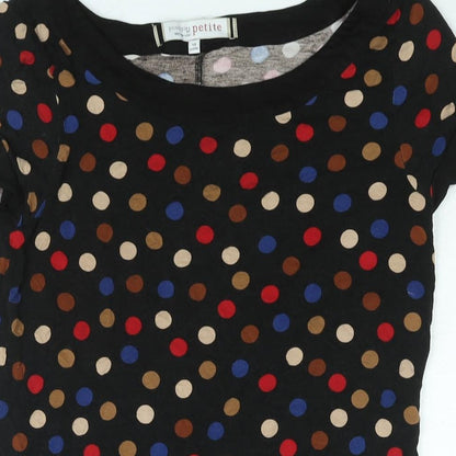 Close-up detail of Principles women’s black polka dot viscose mini, size UK 10, boat neck pullover