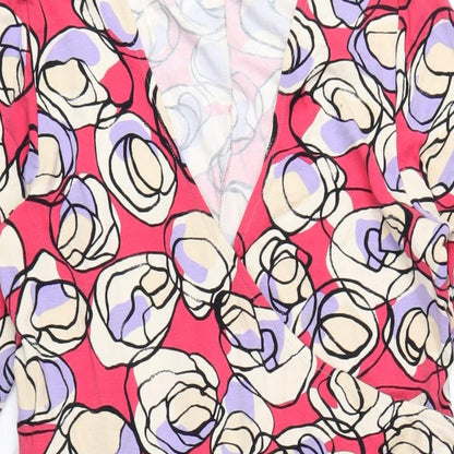 Close-up detail of Betty Jackson women’s pink geometric viscose a-line, size UK 14, v-neck pullover