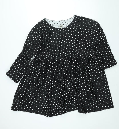 Additional front view of ASOS women’s black polka dot polyester a-line, size UK 12, round neck pullover