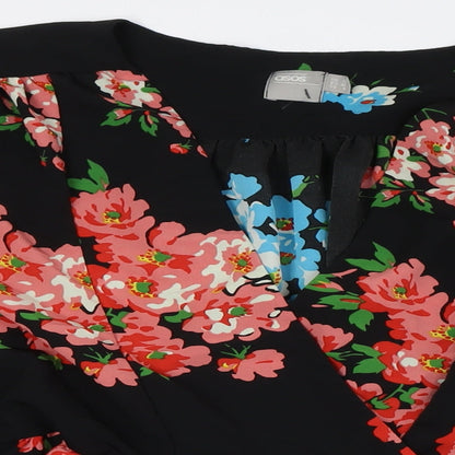 Close-up detail of ASOS women’s multicoloured floral polyester basic button-up, size UK 12, v-neck