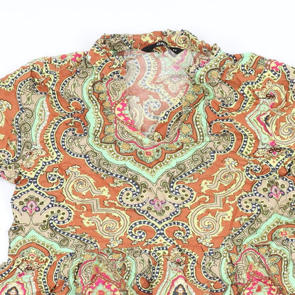 Close-up detail of Only women’s multicoloured geometric viscose shift, size UK 6, v-neck pullover