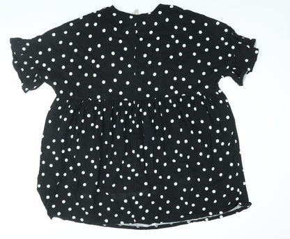 Back view of ASOS women’s black polka dot cotton shift, size UK 14, round neck pullover - smocked