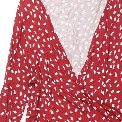 Close-up detail of Principles women’s red geometric viscose a-line, size UK 14, v-neck pullover