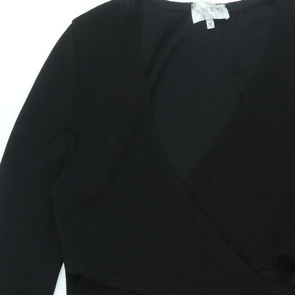Close-up detail of In the Style women’s black polyester bodycon, size UK 12, v-neck pullover - cut out