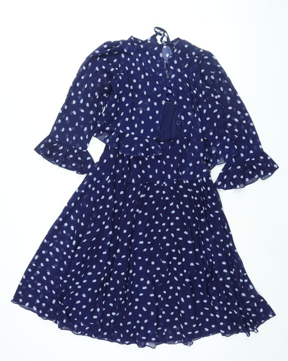 Back view of ASOS women’s blue polka dot polyester shift, size UK 10, round neck zip - layered frill