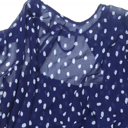 Close-up detail of ASOS women’s blue polka dot polyester shift, size UK 10, round neck zip - layered frill