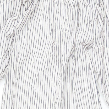Close-up detail of ASOS women’s white striped polyester a-line, size UK 8, off the shoulder pullover