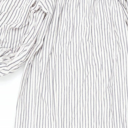 Brand and care label for ASOS women’s white striped polyester a-line, size UK 8, off the shoulder pullover