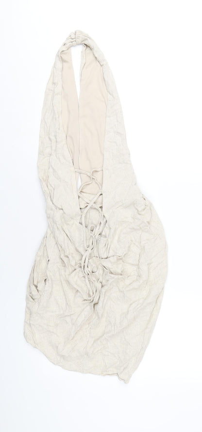 Back view of ASOS women’s beige viscose mini, size UK 10, halter zip