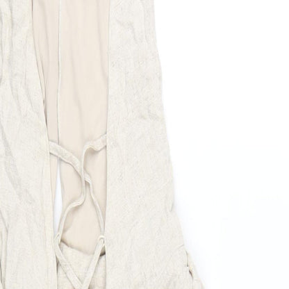 Brand and care label for ASOS women’s beige viscose mini, size UK 10, halter zip