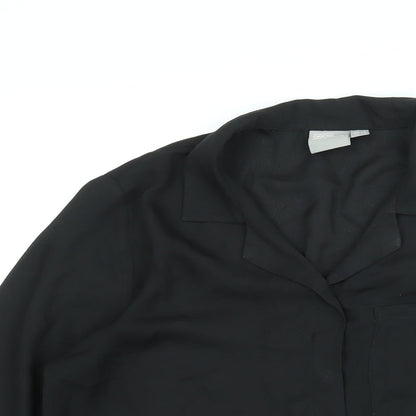 Close-up detail of ASOS women’s black polyester basic button-up, size UK 8, collared