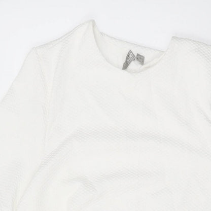 Close-up detail of ASOS women’s white polyester a-line, size UK 10, round neck pullover
