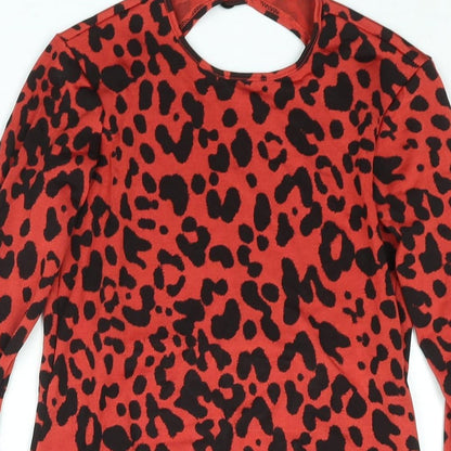 Close-up detail of ASOS women’s red animal print polyester mini, size UK 8, round neck button - backless