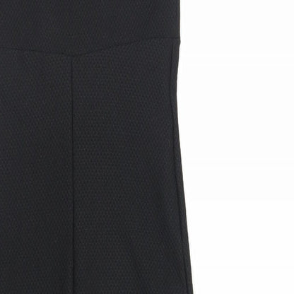 Brand and care label for Miss Selfridge women’s black polyester bodycon, size UK 10, sweetheart pullover