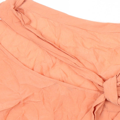Brand and care label for Mexx women’s orange viscose tunic blouse, size UK 8, boat neck