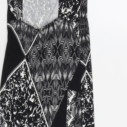 Brand and care label for Miss Selfridge women’s black geometric viscose a-line, size UK 8, square neck pullover