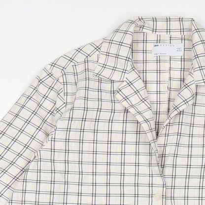 Close-up detail of ASOS' women’s multicoloured plaid cotton basic button-up, size UK 8, collared - oversized