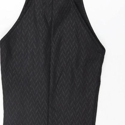 Brand and care label for Miss Selfridge women’s black polyester bodycon, size UK 4, round neck pullover