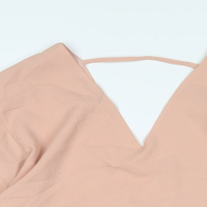 Close-up detail of ASOS women’s pink polyester a-line, size UK 10, v-neck pullover