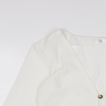 Close-up detail of Missguided women’s white polyester basic blouse, size UK 6, v-neck
