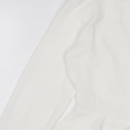 Brand and care label for Missguided women’s white polyester basic blouse, size UK 6, v-neck