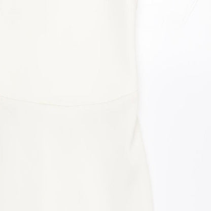 Close-up detail of ASOS women’s white polyester sheath, size UK 8, sweetheart pullover