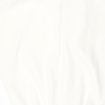 Brand and care label for ASOS women’s white polyester shift, size UK 10, collared pullover