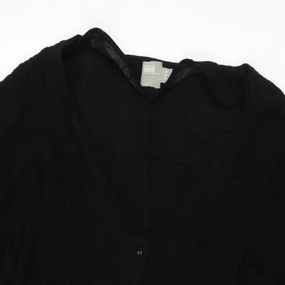 Close-up detail of ASOS women’s black viscose shift, size UK 10, v-neck button