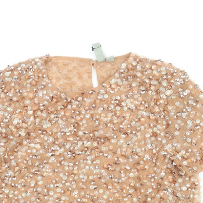 Close-up detail of ASOS women’s pink polyester basic blouse, size UK 4, round neck - sequin