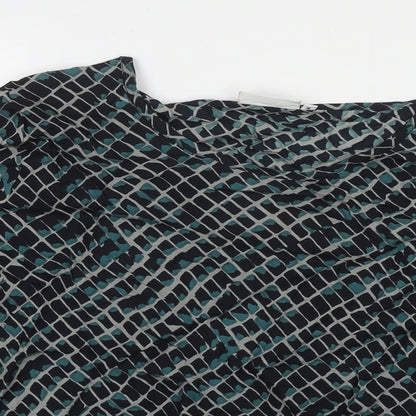 Close-up detail of Masai women’s black geometric viscose basic blouse, size M, round neck
