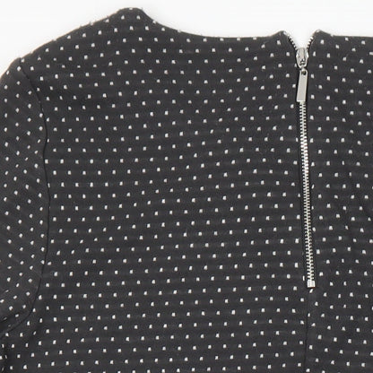 Close-up detail of Roman women’s grey polka dot polyester sheath, size UK 14, boat neck