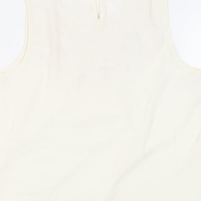 Brand and care label for Miss Selfridge women’s ivory polyester basic blouse, size UK 10, round neck - neckline detail