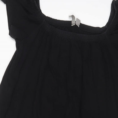 Close-up detail of ASOS women’s black cotton a-line, size UK 10, scoop neck pullover