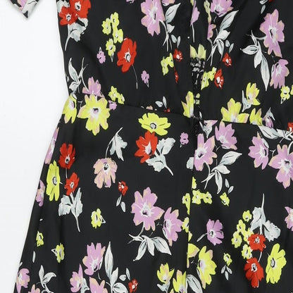 Brand and care label for ASOS women’s black floral polyester maxi, size UK 10, round neck zip