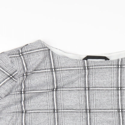 Close-up detail of Dunnes women’s grey plaid polyester basic t-shirt, size UK 20, round neck