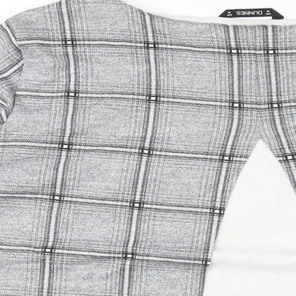 Brand and care label for Dunnes women’s grey plaid polyester basic t-shirt, size UK 20, round neck