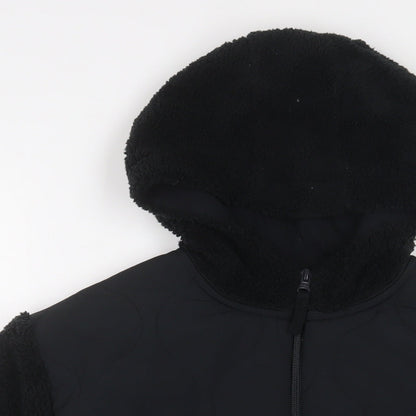 Close-up detail of Next girls’ black jacket, size 9, years zip