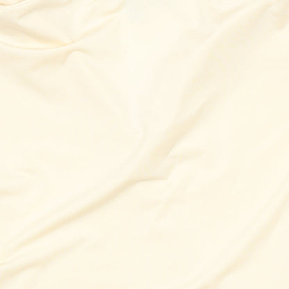 Brand and care label for ASOS women’s ivory polyester basic t-shirt, size M, collared