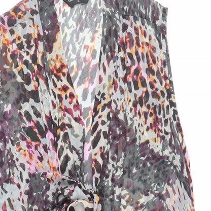 Close-up detail of Miss Selfridge women’s multicoloured animal print polyester basic button-up, size UK 10, v-neck - sheer