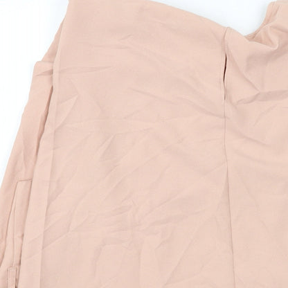 Brand and care label for ASOS women’s pink polyester basic tank, size UK 18, round neck