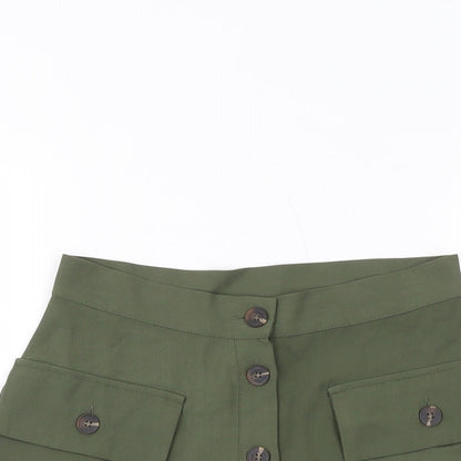 Close-up detail of ASOS women’s green polyester a-line skirt, size UK 8, button