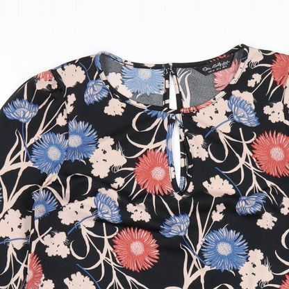 Close-up detail of Miss Selfridge women’s multicoloured geometric polyester a-line, size UK 8, round neck button