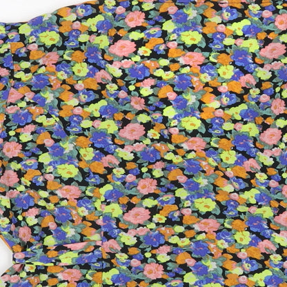 Brand and care label for ASOS women’s multicoloured floral polyester basic blouse, size UK 12, v-neck