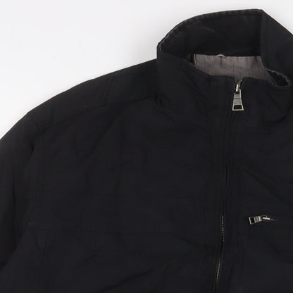Close-up detail of Autograph men’s black jacket coat, size M, zip