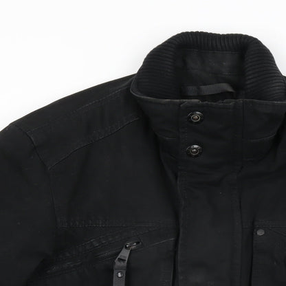 Close-up detail of ESPRIT men’s black jacket coat, size S, zip