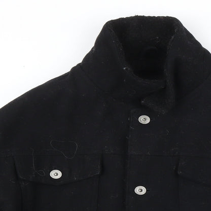 Close-up detail of ASOS men’s black jacket, size L, button
