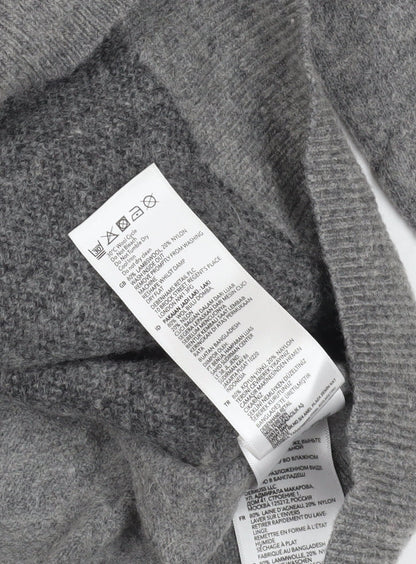 Close-up detail of Hammond & Co. Grey Medium Check Wool jumper